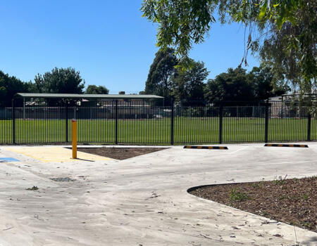 Concrete car park at edge of sporting oval in Echuca